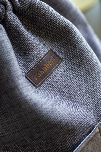 Szary plecak z kieszeniami plecionka