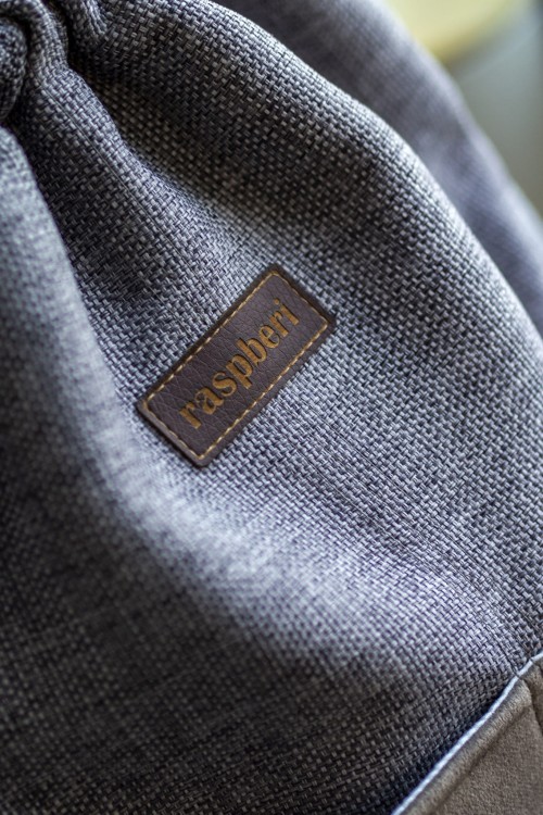 Szary plecak z kieszeniami plecionka