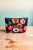 Etui na klucze z czarnego weluru w kolorowe kwiaty – handmade